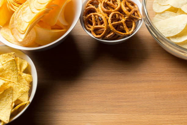 istock Salty snacks. Pretzels, chips, crackers 1152174411