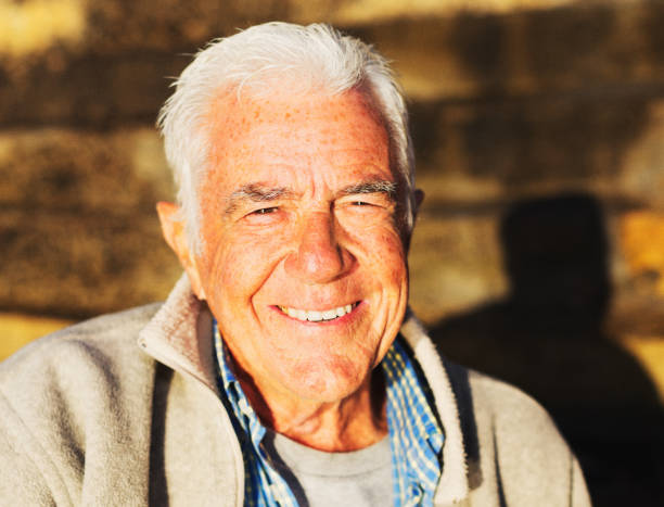 istock Tanned senior man smiling in the sunlight 1152176407