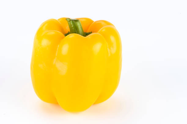 istock red, yellow bell pepper on white background 1152176463