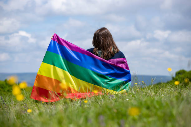 istock Young woman with LGBT flag. 1152177287