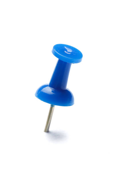 istock close up of a pushpin on white background 1152177380