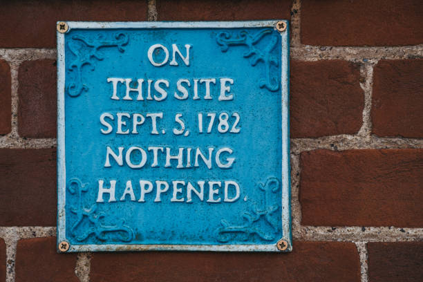 istock Humour sign on a red brick wall saying that nothing happened on that site on 5th September 1782. 1152177792