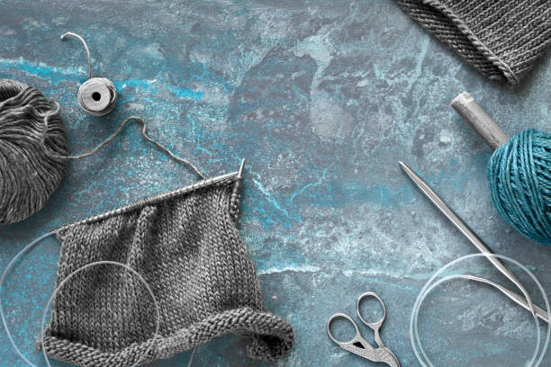 istock Various wool yarn and knitting needles, knitting hobby background 1152179191