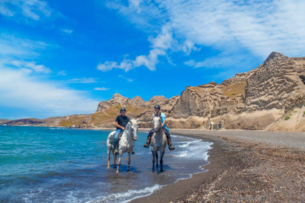 istock Horse riding on the beach in Santorini 1152179454