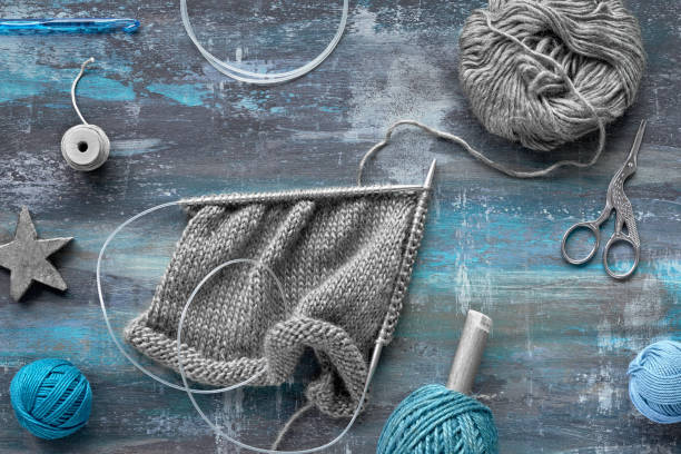 istock Various wool yarn and knitting needles, knitting hobby background 1152179494