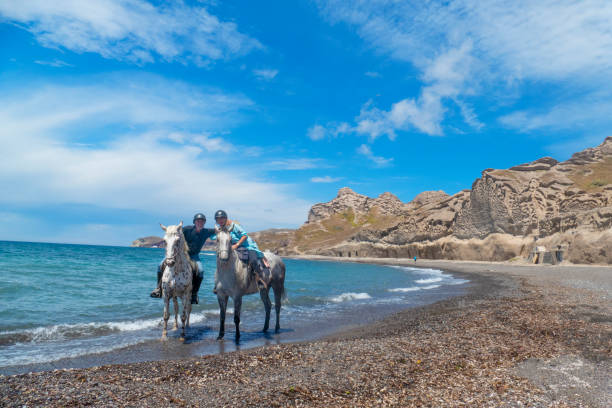 istock Horse riding on the beach in Santorini 1152179846