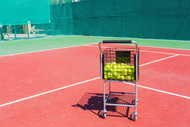 New red tennis court with white lines combined with gray pickleball lines
