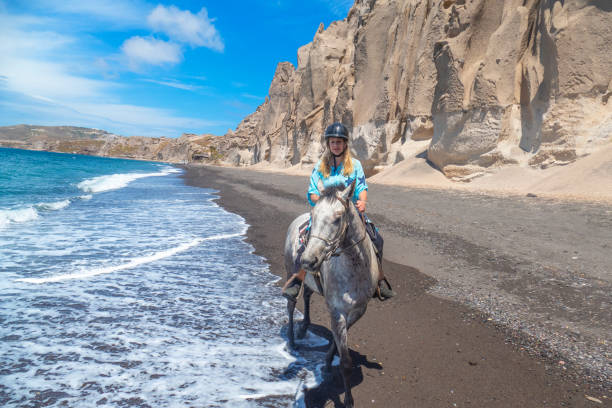istock Horseback riding on the beach in Santorini 1152180798