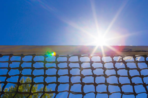 istock Tennis net on blue sky 1152180815