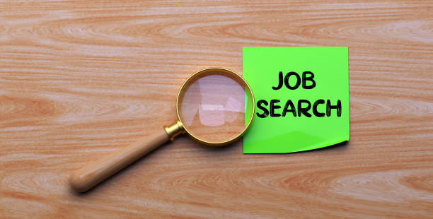 istock JOB SEARCH - MAGNIFYING GLASS CONCEPT 1152181095