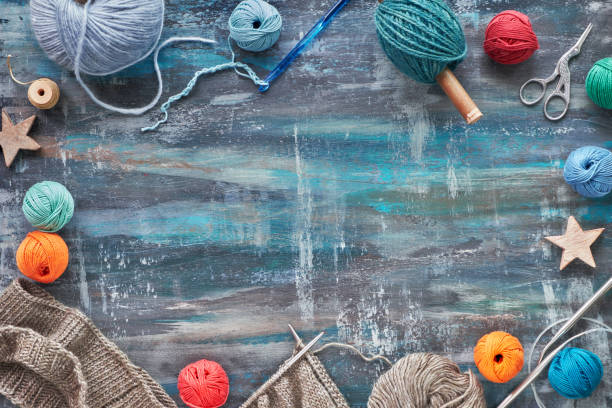 istock Various wool yarn and knitting needles, knitting hobby background, copy-space 1152181098