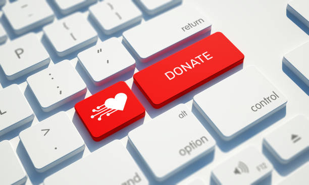 Donate Button on Computer Keyboard Donate Button on Computer Keyboard enter key photos stock pictures, royalty-free photos & images