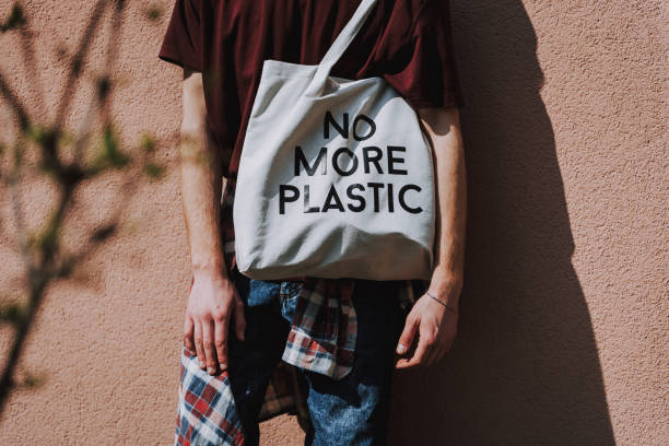 istock Close up hipster man with eco bag outdoor 1152185568