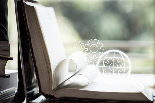 istock SEO search engine or E-book online learning for study concept with Magnifying glass with gear engine on global world checklist on open textbook background. Ideas for analysis over information and data 1152187891