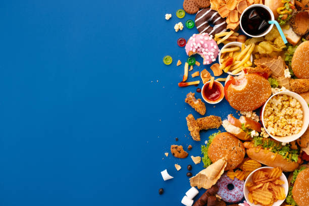 istock Fast food dish on blue background 1152191026