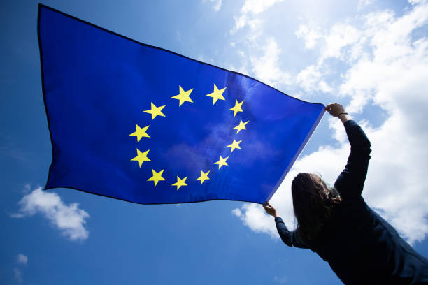 istock Woman with EU flag. 1152192689