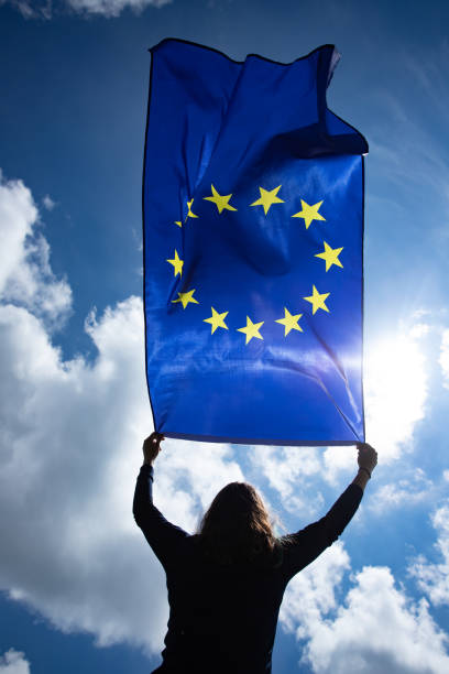 istock Woman with EU flag. 1152192772