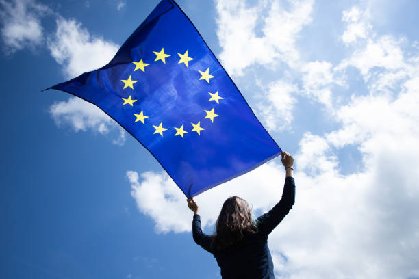 istock Woman with EU flag. 1152193120