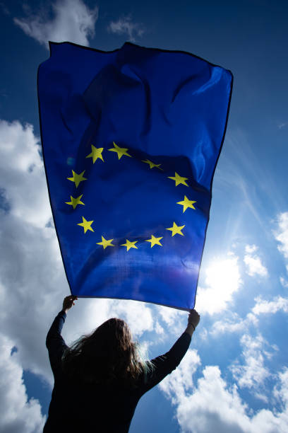 istock Woman with EU flag. 1152193160