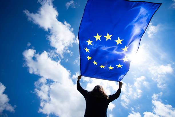 istock Woman with EU flag. 1152193313