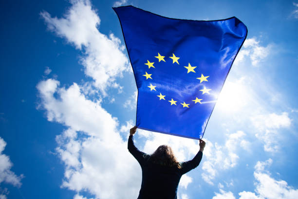 istock Woman with EU flag. 1152193397