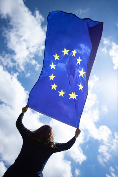 istock Woman with EU flag. 1152194094