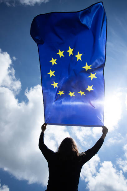 istock Woman with EU flag. 1152194143