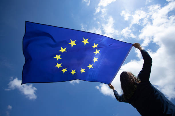 istock Woman with EU flag. 1152194423