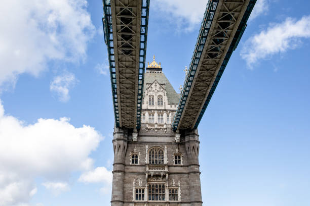 istock Tower bridge in London, Great Britain. Blue sky and white clouds 1152197879