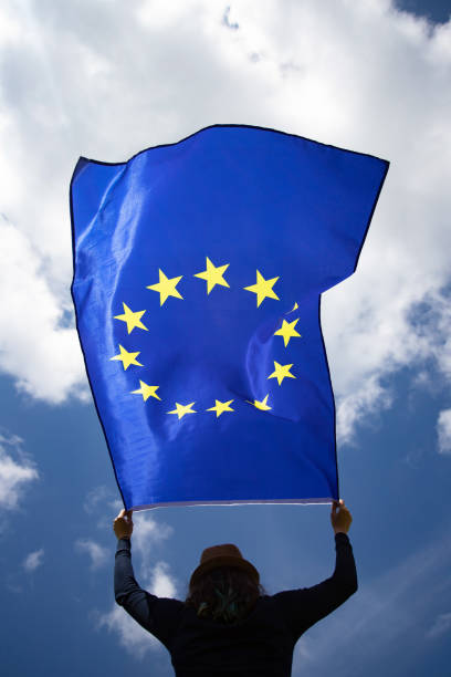 istock Woman with EU flag. 1152198870