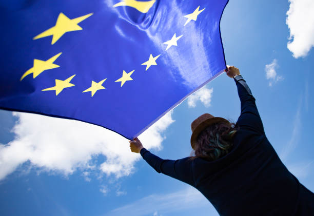 istock Woman with EU flag. 1152199153