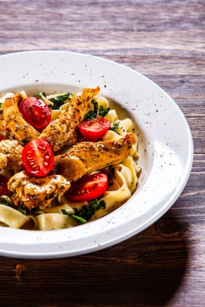 istock Pasta with tomato sauce and chicken nuggets 1152199495