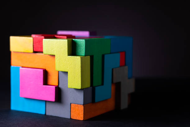 istock Cube made of multicolored wooden geometric shapes. 1152200164