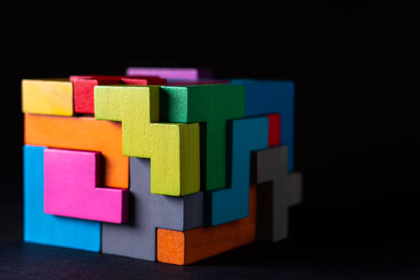 istock Cube made of multicolored wooden geometric shapes. 1152200165