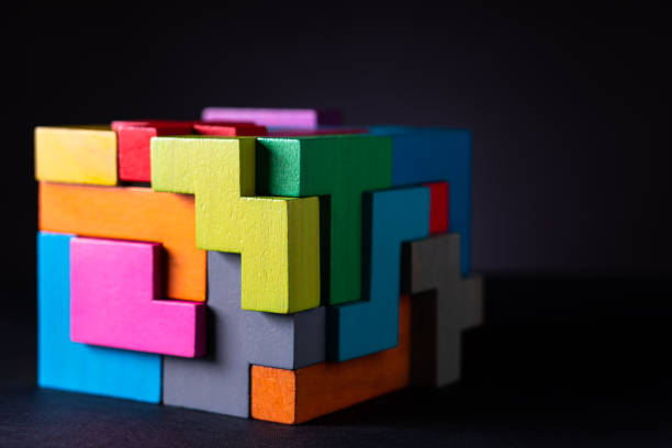istock Cube made of multicolored wooden geometric shapes. 1152200168