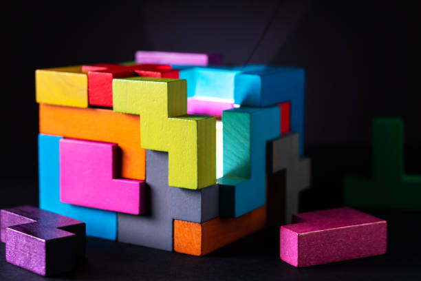 istock Cube made of multicolored wooden geometric shapes. 1152200178