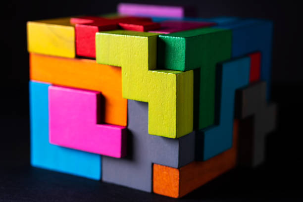 istock Cube made of multicolored wooden geometric shapes. 1152200182
