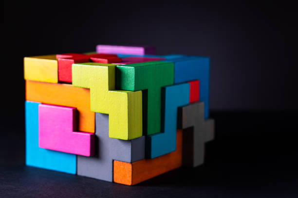istock Cube made of multicolored wooden geometric shapes. 1152200188