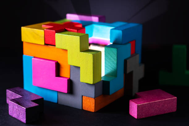istock Cube made of multicolored wooden geometric shapes. 1152200209