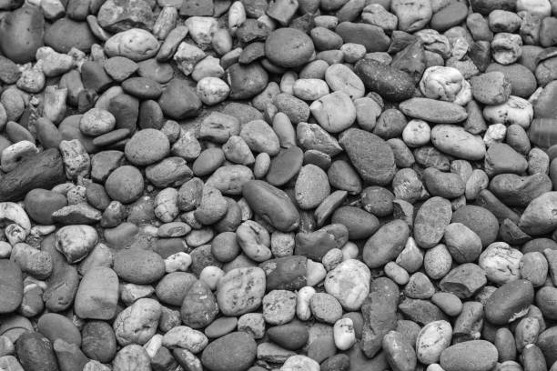 istock Pictured black and white gravel on the sidewalk 1152200833