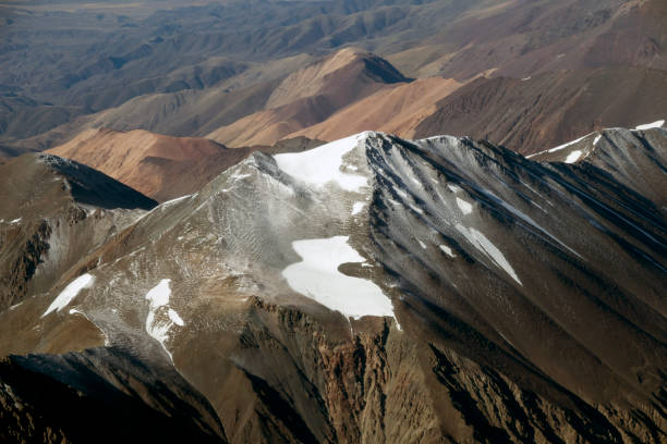 istock Peaks of the mountains covered with ice and snow 1152202122