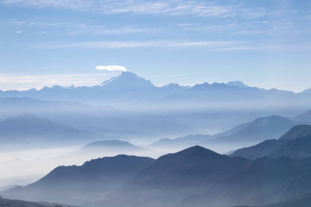 istock Misty blue Andean mountain landscape background 1152202195
