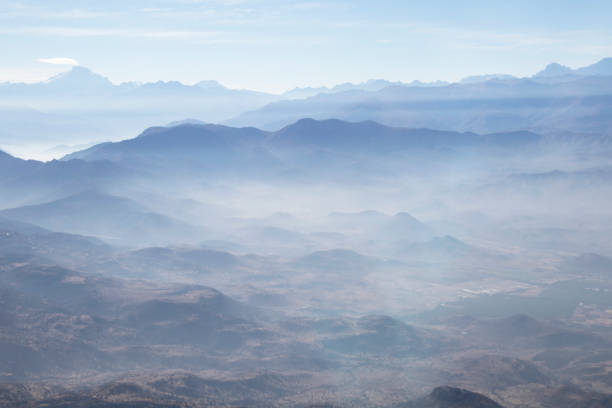 istock Misty blue Andean mountain landscape background 1152202197