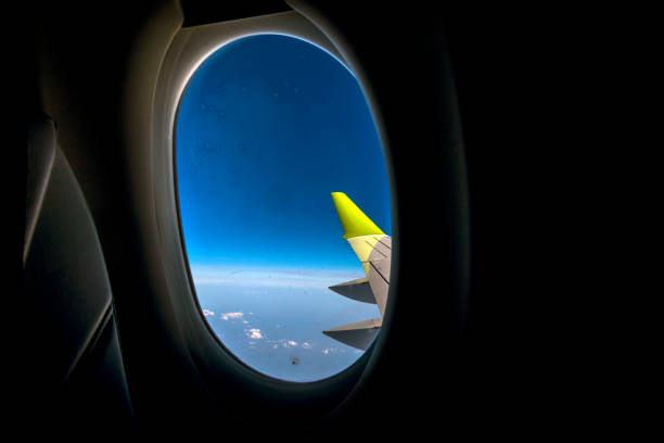 istock Aerial view from plane window with airplane wing 1152202253