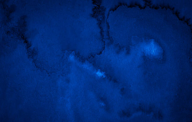 Dark rich blue watercolor background  with torn strokes and uneven divorces. Abstract background for design, layouts and patterns.