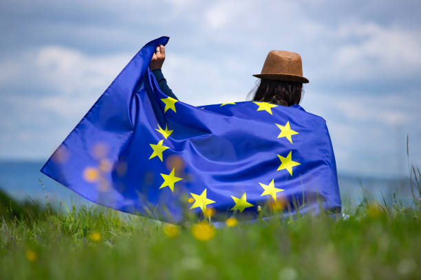 istock Woman with EU flag. 1152202774