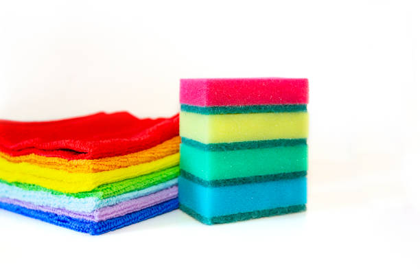istock Brightly multicolored cleaning sponges and rags on white background 1152203041