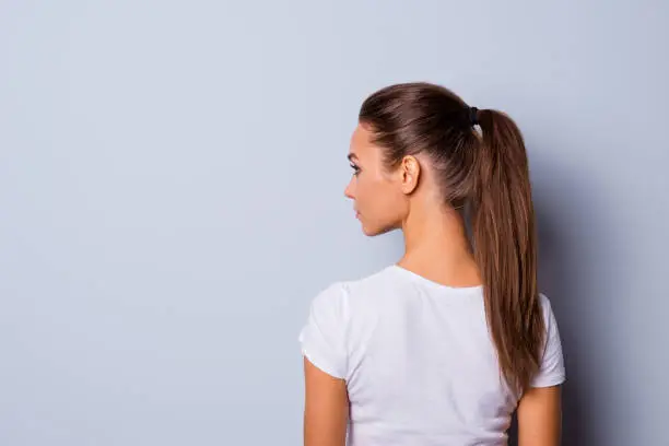 Photo of Close up back rear behind side profile view photo amazing beautiful she her lady look side empty space not smiling reliable person wear casual white t-shirt clothes isolated grey background
