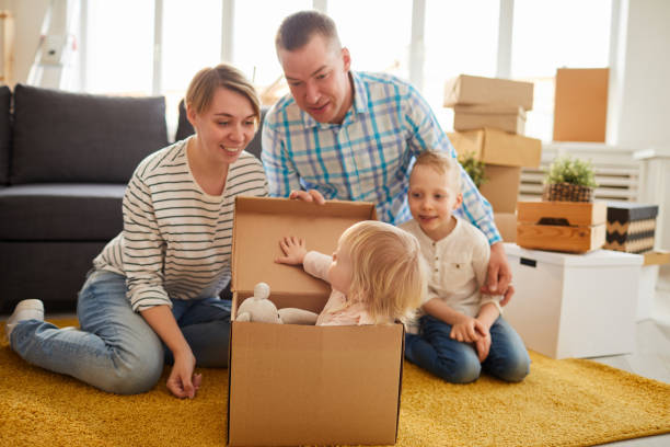 istock Pretty daughter hiding inside of box 1152205830