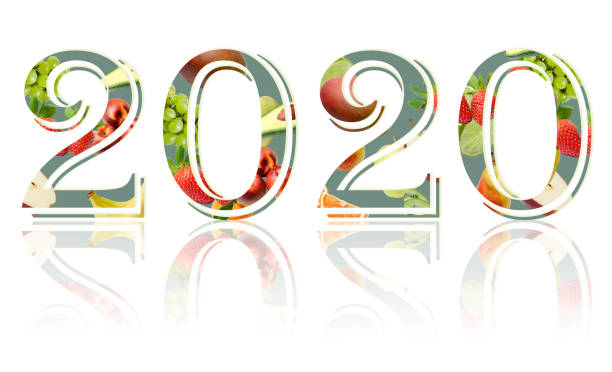 istock Figures New Year 2020 on a white background decorated with fruit composition. Design element for print or web. 1152206260
